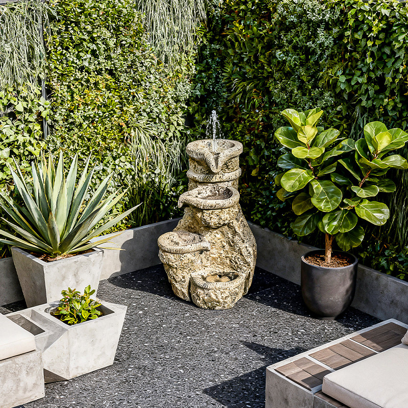 Outdoor sofa arrangement for functional garden relaxation.