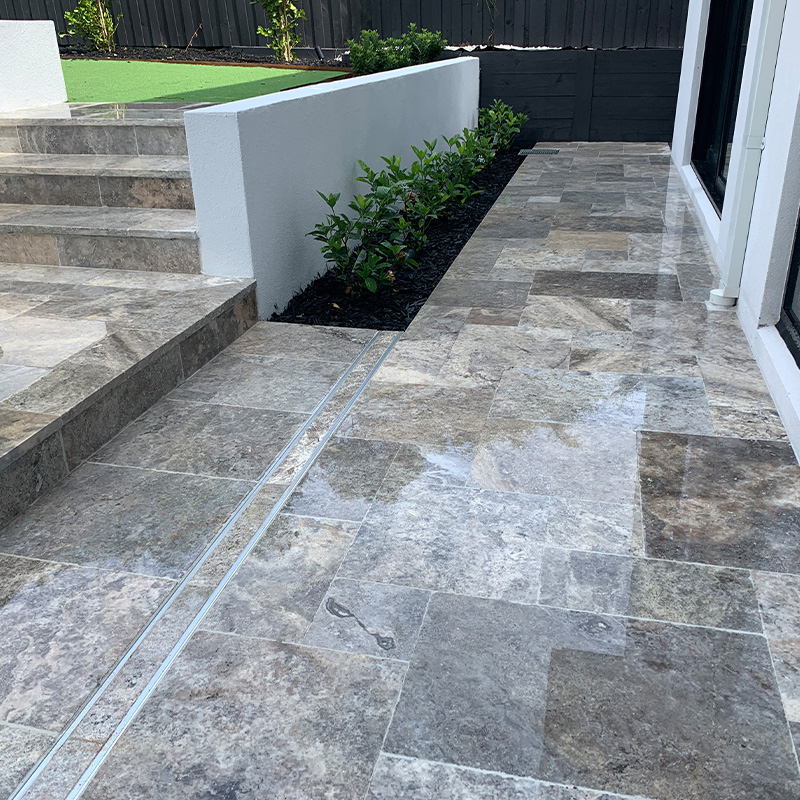 Premium travertine tiles for patio, walkway, and garden landscaping.